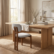 Light Grey Upholstered Dining Chair styled in a room