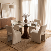Round Glass Dining Table styled in a room