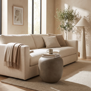 Round Grey End Table Modern styled in a room