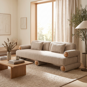 Beige Fabric Sofa With Burl Wood Accents styled in a room