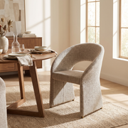 Upholstered Dining Arm Chair styled in a room