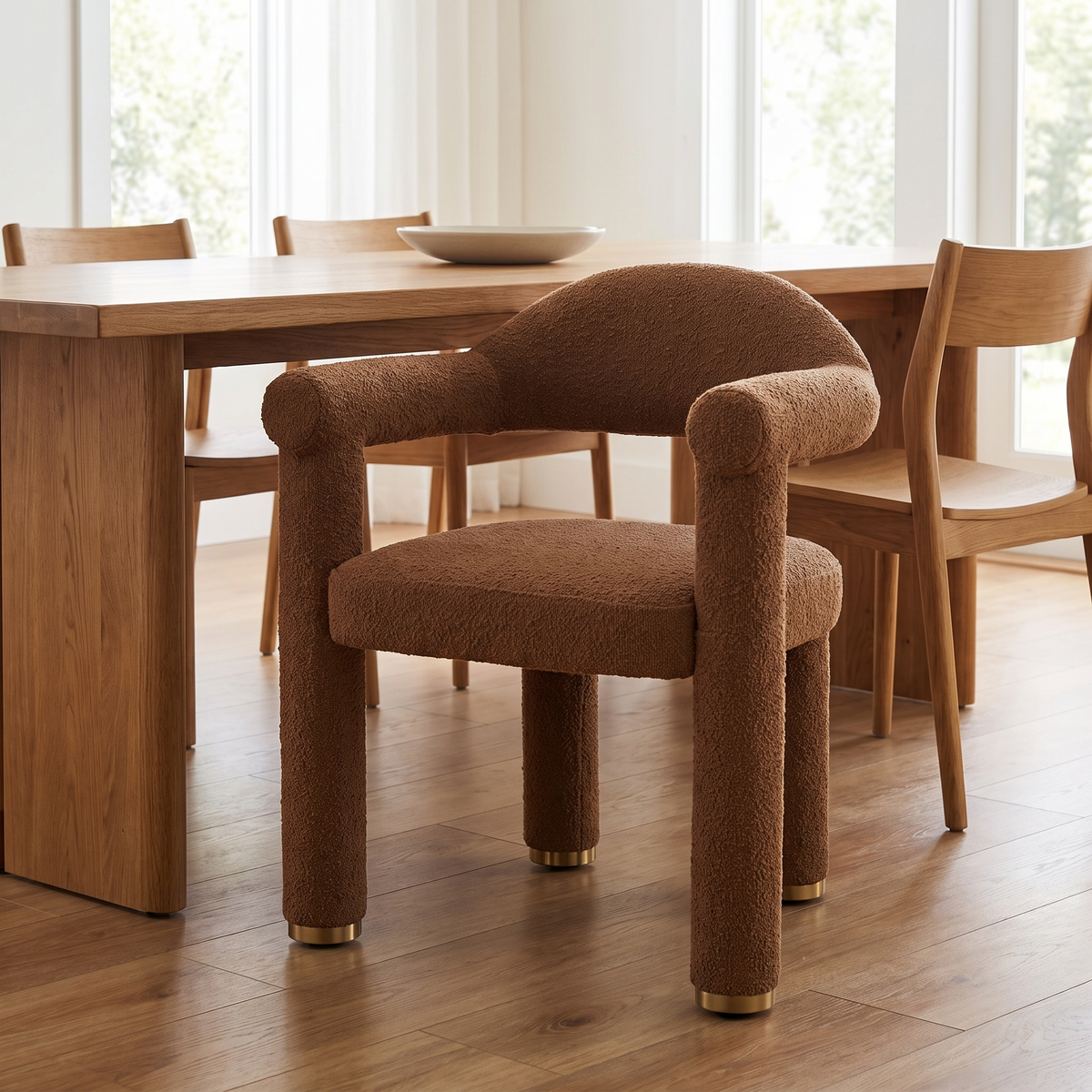 Upholstered Dining Armchair in Brown styled in a room