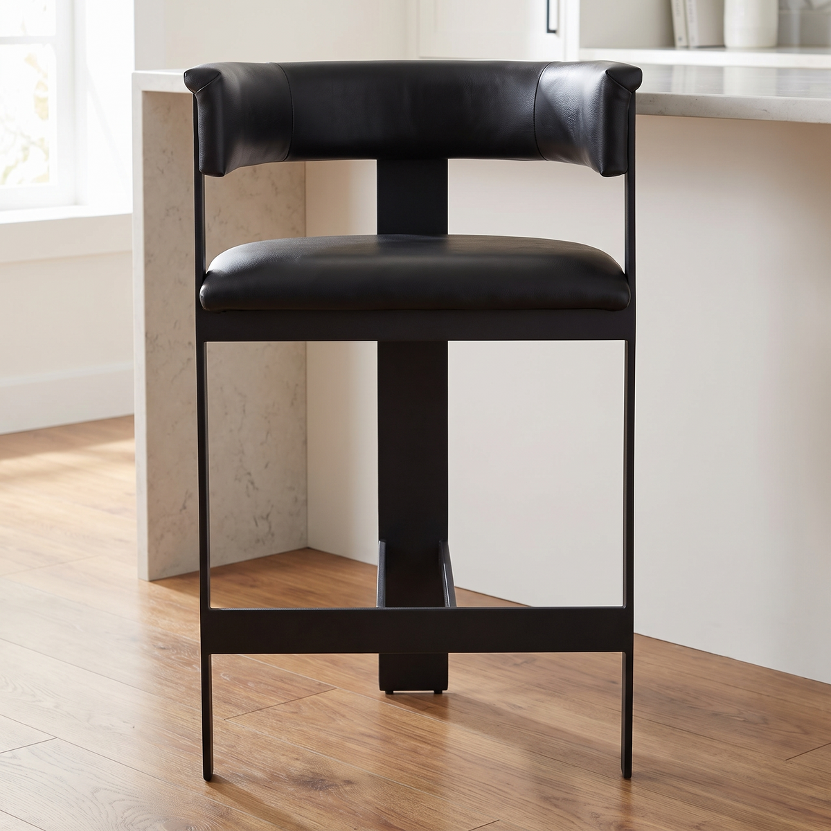 Faux Leather Counter Stool in Black styled in a kitchen